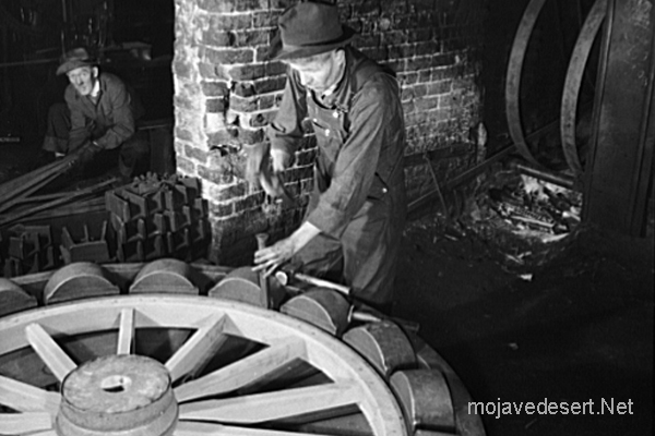 fitting a steel tire to the wagon wheel assembly